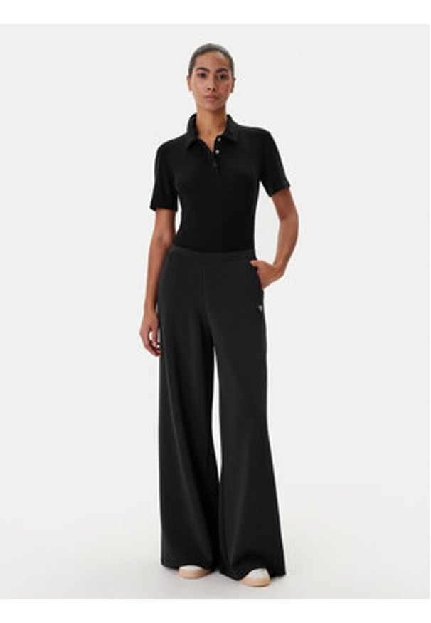 Guess Body V6RP00 KD772 Czarny Slim Fit. Kolor: czarny. Materiał: lyocell