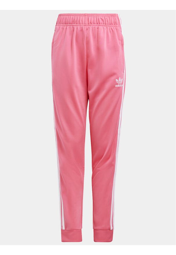 Adidas - adidas Spodnie dresowe adicolor SST IN8492 Różowy Regular Fit. Kolor: różowy. Materiał: syntetyk