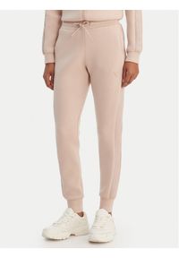 Guess Spodnie dresowe V2YB18 K7UW2 Beżowy Regular Fit. Kolor: beżowy. Materiał: wiskoza #1