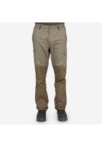 SOLOGNAC - Spodnie outdoor renfort 100. Kolor: zielony, brązowy, wielokolorowy. Materiał: materiał, bawełna, poliester. Sport: outdoor