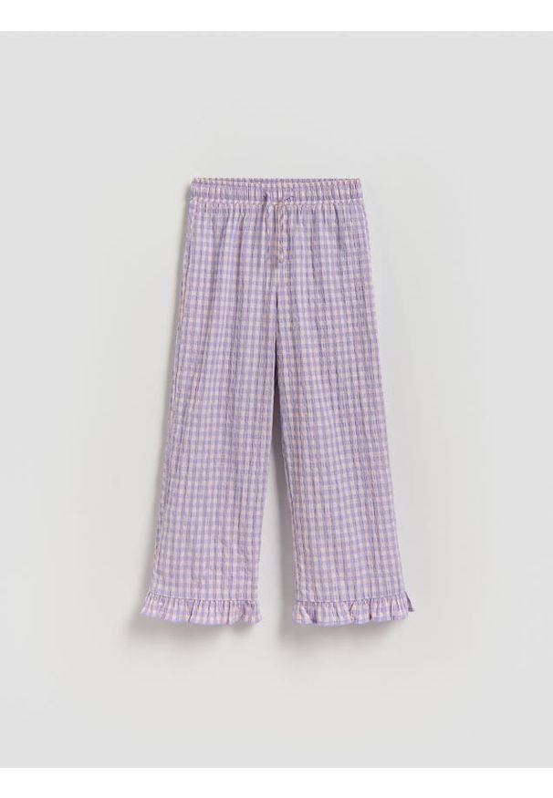 Reserved - Spodnie z gniecionej tkaniny - lawendowy. Kolor: fioletowy. Materiał: tkanina
