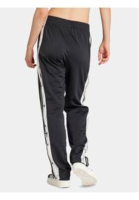 Adidas - adidas Spodnie dresowe Adibreak IU2519 Czarny Regular Fit. Kolor: czarny. Materiał: syntetyk