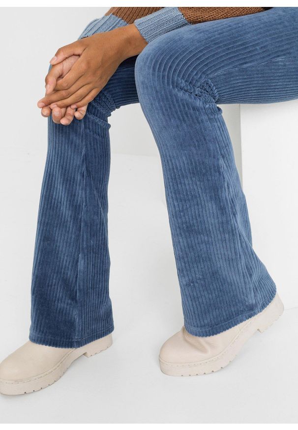 bonprix - Spodnie sztruksowe z poszerzanymi nogawkami. Kolor: niebieski. Materiał: sztruks