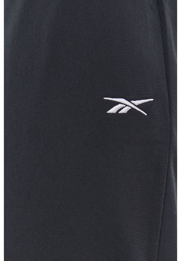 Reebok - Dres. Kolor: czarny. Materiał: dresówka