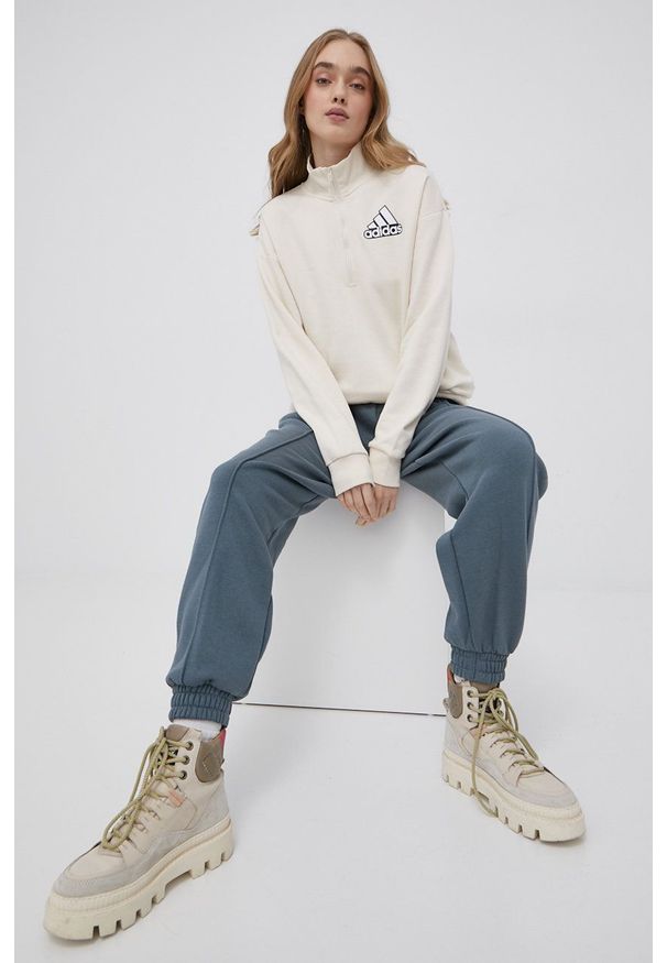Adidas - adidas spodnie damskie gładkie. Kolor: niebieski. Materiał: dzianina, bawełna. Wzór: gładki