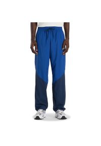 Spodnie męskie New Balance MB61R010NNY - niebieskie. Kolor: niebieski. Materiał: materiał, poliester #1