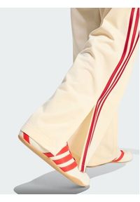 Adidas - adidas Spodnie dresowe 159027 Żółty Loose Fit. Kolor: żółty. Materiał: dresówka #2