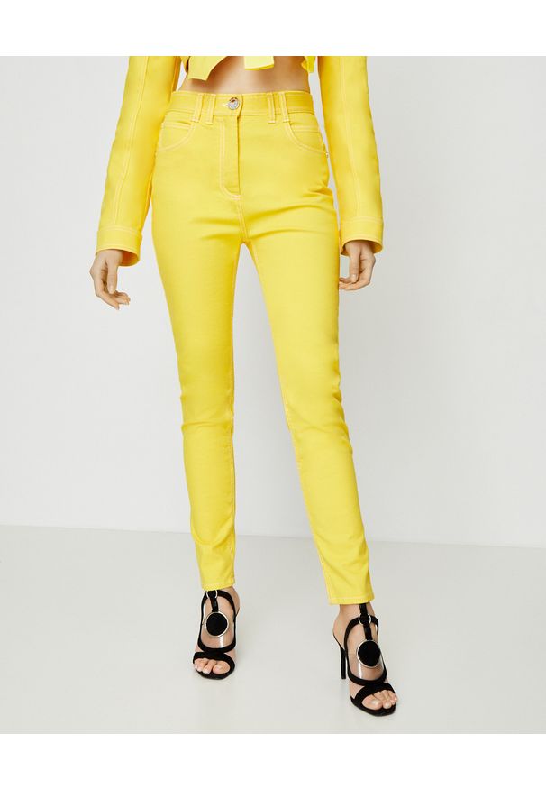 Balmain - BALMAIN - Żółte jeansy z wysokim stanem. Stan: podwyższony. Kolor: żółty. Wzór: aplikacja