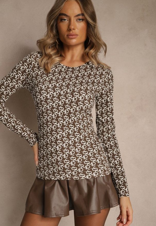 Renee - Biało-Brązowa Bluzka Longsleeve z Bawełny Ozdobiony Literowym Wzorem Javelina. Okazja: na co dzień. Kolor: biały. Materiał: bawełna. Długość rękawa: długi rękaw. Wzór: aplikacja. Styl: klasyczny, casual, elegancki