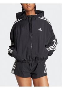 Adidas - adidas Wiatrówka Essentials 3-Stripes Woven Windbreaker HT3399 Czarny Loose Fit. Kolor: czarny. Materiał: syntetyk