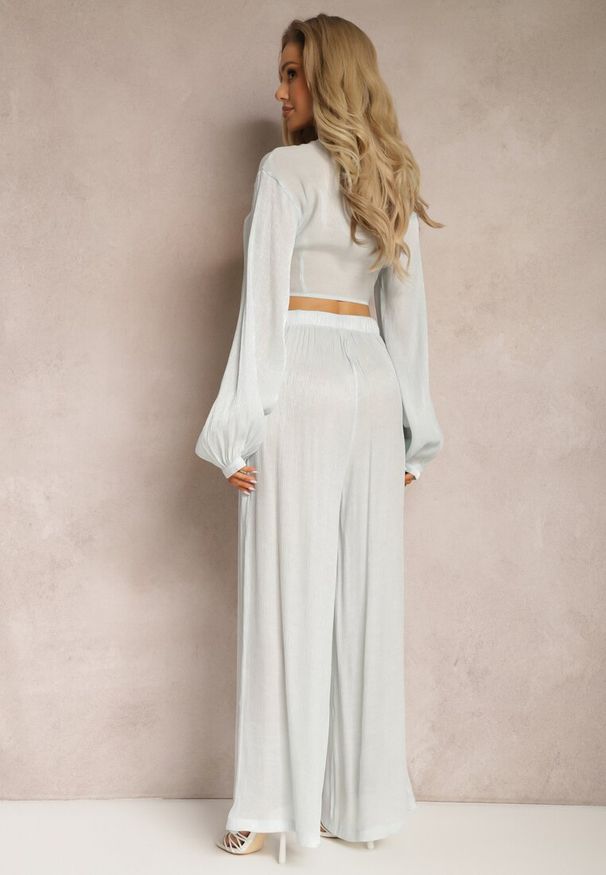 Renee - Jasnoniebieski Komplet Wiązana Koszula z Luźnym Rękawem i Szerokie Spodnie Aphina. Kolor: niebieski