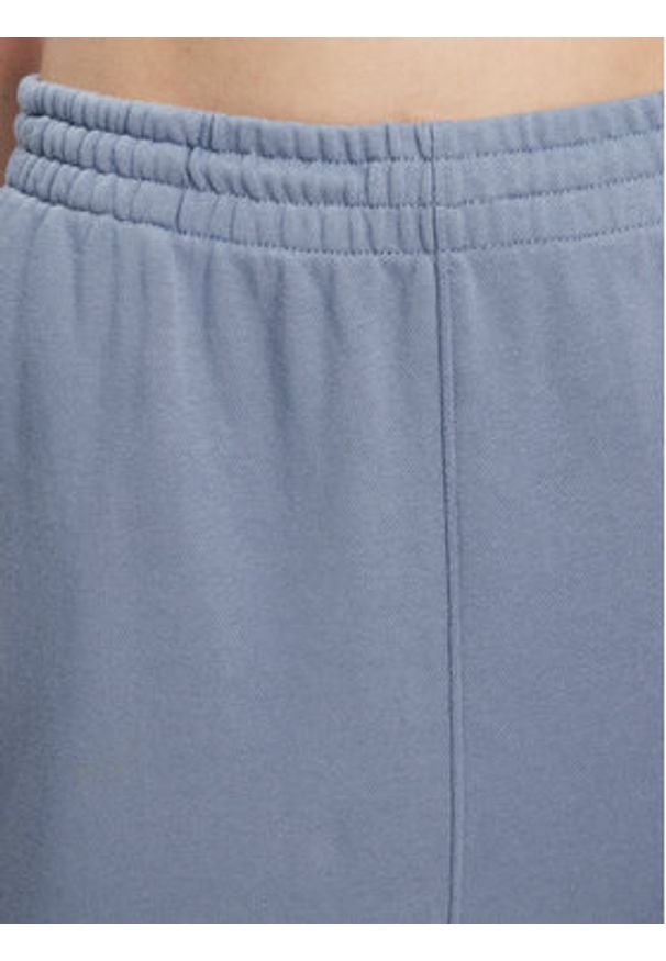 TOMMY HILFIGER - Tommy Hilfiger Spodnie dresowe UW0UW05793 Niebieski Regular Fit. Kolor: niebieski. Materiał: bawełna