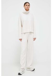 DKNY - Dkny bluza damska kolor beżowy gładka. Kolor: beżowy. Materiał: dzianina. Długość rękawa: raglanowy rękaw. Wzór: gładki #4