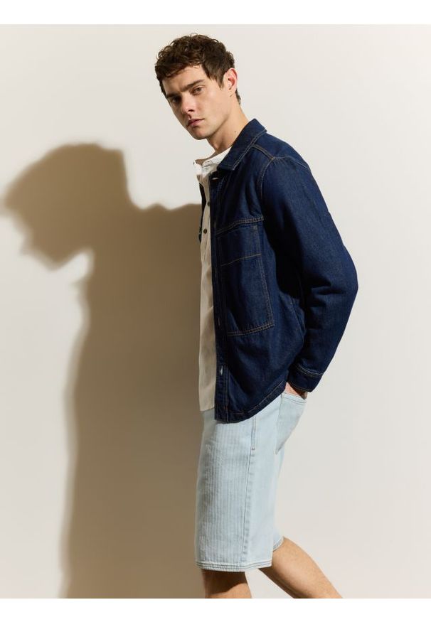 Reserved - Szorty loose fit - niebieski. Kolor: niebieski. Materiał: denim