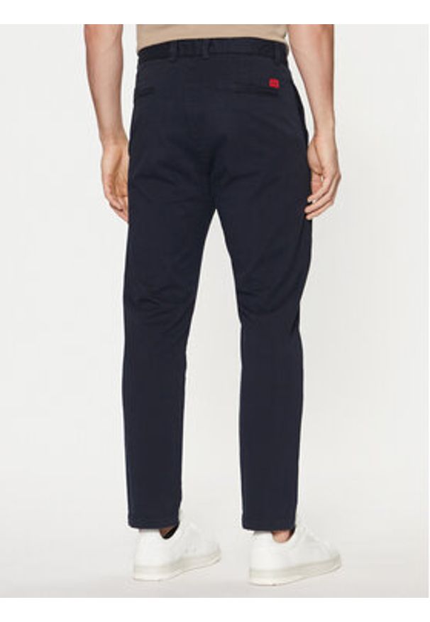 Hugo - HUGO Chinosy 50530886 Granatowy Slim Fit. Kolor: niebieski. Materiał: bawełna