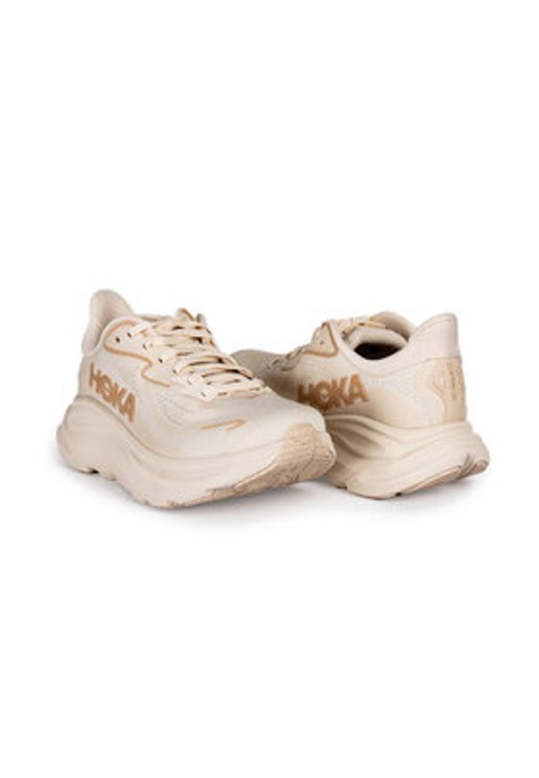 HOKA - Hoka Sneakersy Clifton 10 1162031 Beżowy. Kolor: beżowy. Materiał: materiał