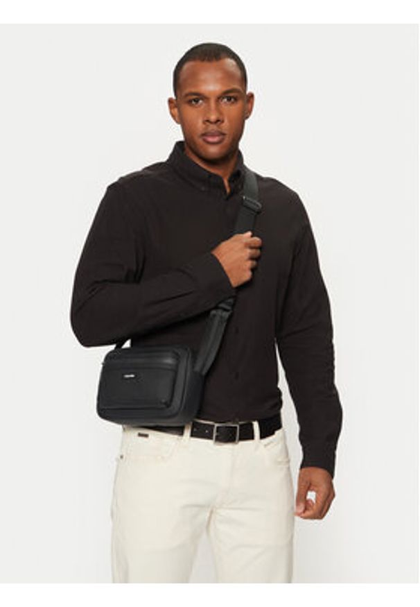 Calvin Klein Saszetka K50K512810 Czarny. Kolor: czarny. Materiał: materiał
