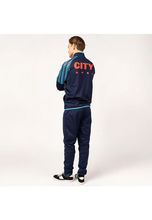 MANCHESTER CITY - Dres piłkarski dla dorosłych Manchester City 24/25. Kolor: niebieski. Materiał: dresówka. Sport: piłka nożna