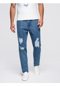 Ombre Clothing - Jeansowe spodnie męskie CARROT FIT z przetarciami – niebieskie V2 - Rozmiar: XL. Okazja: na co dzień. Kolor: niebieski. Materiał: jeans. Wzór: aplikacja. Styl: klasyczny, casual