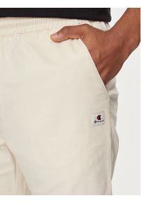 Champion Spodnie dresowe 219865 Beżowy Custom Fit. Kolor: beżowy. Materiał: bawełna #5