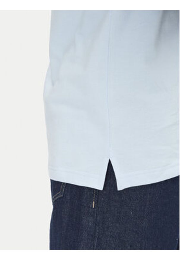 Tommy Jeans Polo DM0DM20676 Błękitny Slim Fit. Typ kołnierza: polo. Kolor: niebieski. Materiał: bawełna