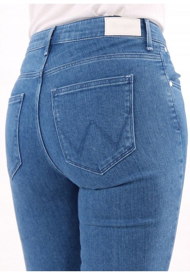 Wrangler - WRANGLER SLIM CROP DAMSKIE SPODNIE JEANSOWE RETRO ACTION W248GU124 112127961. Styl: retro