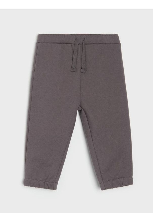 Sinsay - Bawełniane spodnie jogger - brązowy. Kolor: brązowy. Materiał: bawełna
