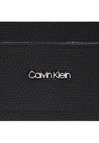 Calvin Klein Saszetka nerka Minimalism Camera Bag K50K509574 Czarny. Kolor: czarny. Materiał: skóra