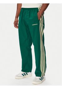 Adidas - adidas Spodnie dresowe Cutline Track KW8022 Zielony Regular Fit. Kolor: zielony. Materiał: syntetyk #1