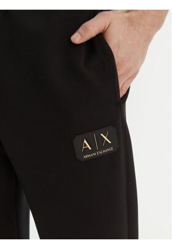Armani Exchange Spodnie dresowe XM001774 AF19936 UC001 Czarny Regular Fit. Kolor: czarny. Materiał: syntetyk