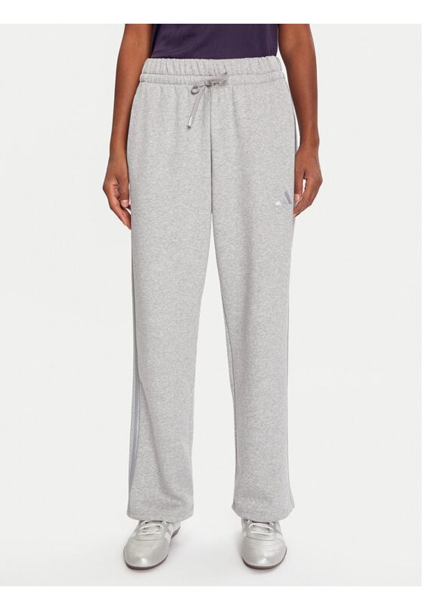 Adidas - adidas Spodnie dresowe Holiday 3-Stripes Fleece JM1888 Szary Loose Fit. Kolor: szary. Materiał: bawełna