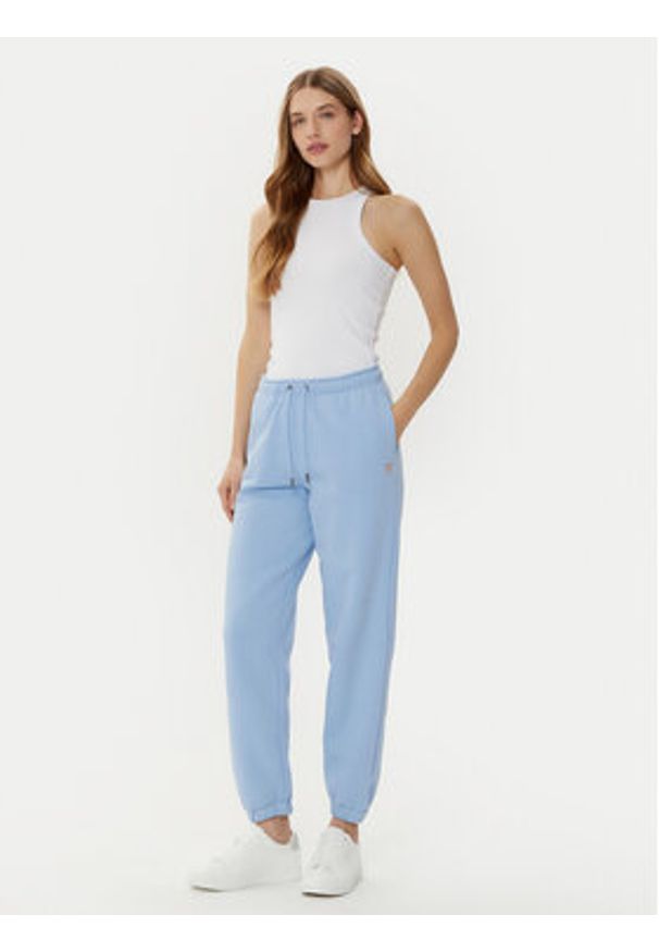 Guess Jeans Spodnie dresowe W4YB33 KC811 Niebieski Regular Fit. Kolor: niebieski. Materiał: syntetyk