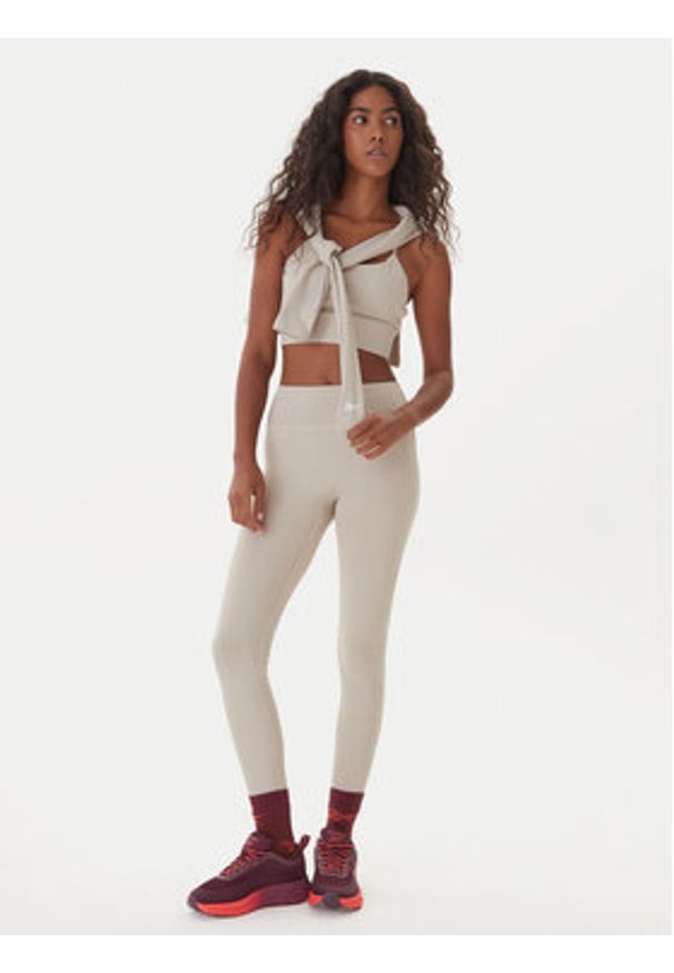 Reebok Legginsy RK25311CCW Beżowy Slim Fit. Kolor: beżowy. Materiał: syntetyk