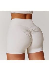 Intica - Spodenki sportowe modelujące z elastycznym pasem do treningu i biegania Essence. Kolor: biały. Materiał: materiał. Sport: fitness