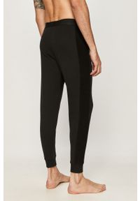 Calvin Klein Underwear - Spodnie piżamowe. Kolor: czarny. Materiał: bawełna, dzianina, elastan. Wzór: nadruk #2