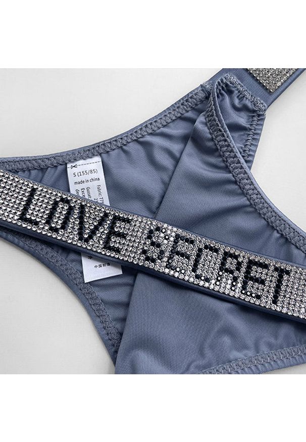 Intica - Stringi sportowe z cyrkoniami do codziennego użytku Dorolisa. Kolor: zielony. Materiał: materiał