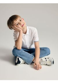 Reserved - Spodnie carrot fit - niebieski. Kolor: niebieski #1