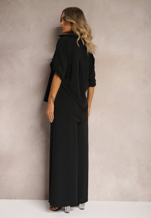 Renee - Czarny Komplet Szerokie Spodnie i Koszula z Falbanami Rivathins. Kolor: czarny