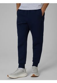 4f - 4F Spodnie dresowe joggery męskie - granatowe XL. Kolor: niebieski. Materiał: dresówka. Sport: fitness #2