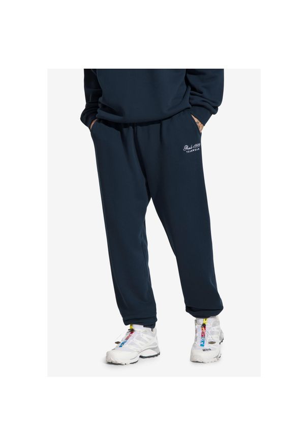 Spodnie dresowe męskie Prosto Football. Kolor: niebieski. Materiał: dresówka. Sport: piłka nożna