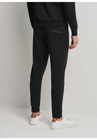 Ochnik - Czarne spodnie dresowe męskie. Kolor: czarny. Materiał: bawełna #5