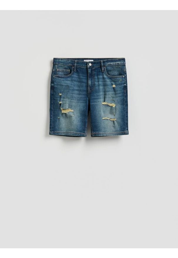 Reserved - Jeansowe szorty z przetarciami - indigo jeans. Materiał: jeans