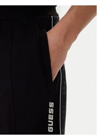 Guess Spodnie dresowe Mickey Z2YB09 KB3P2 Czarny Regular Fit. Kolor: czarny. Materiał: bawełna #5