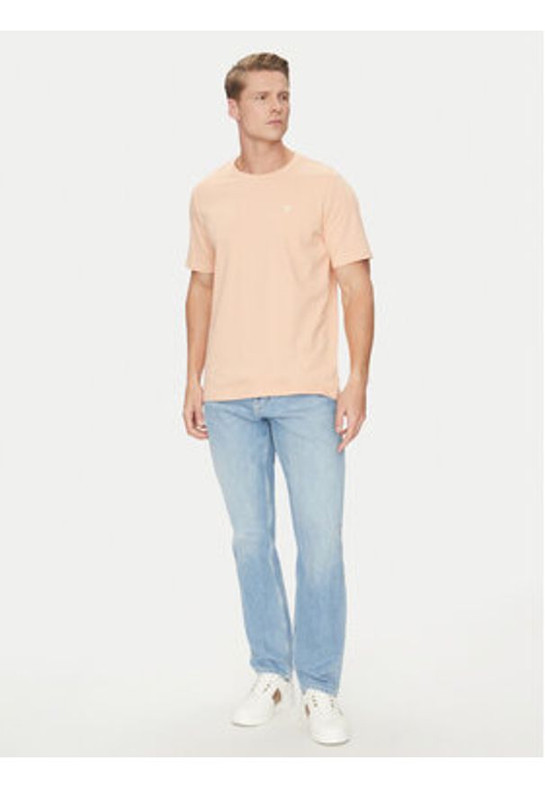 Guess T-Shirt M4YI0A KCCM1 Pomarańczowy Regular Fit. Kolor: pomarańczowy. Materiał: bawełna