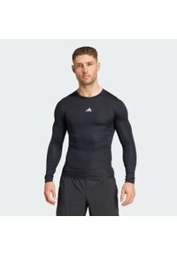 Adidas - Koszulka TECHFIT Compression Training Long Sleeve. Kolor: czarny. Materiał: materiał. Długość rękawa: długi rękaw. Technologia: Techfit (Adidas). Sport: fitness