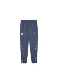 Puma - Spodnie dresowe Prematch Manchester City 2024/25. Kolor: niebieski. Materiał: dresówka, tkanina