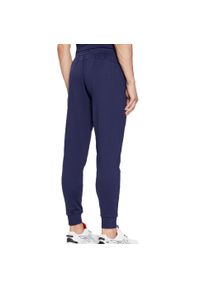 Spodnie treningowe męskie Under Armour 1373362410. Kolor: niebieski. Materiał: dresówka. Sport: bieganie