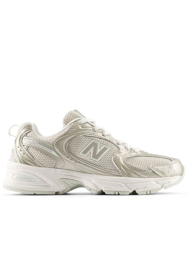 Buty unisex New Balance U5301Z0 - beżowe. Kolor: beżowy. Materiał: materiał, syntetyk. Szerokość cholewki: normalna. Sport: turystyka piesza