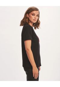 RETROFETE - Czarny t-shirt z grafiką ust. Kolor: czarny. Materiał: bawełna. Styl: klasyczny #3