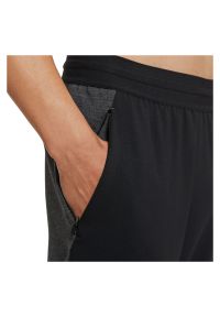 Spodnie treningowe męskie Nike Yoga Dri-FIT DH1933. Materiał: materiał, włókno, dzianina, bawełna, poliester. Technologia: Dri-Fit (Nike). Wzór: gładki #5